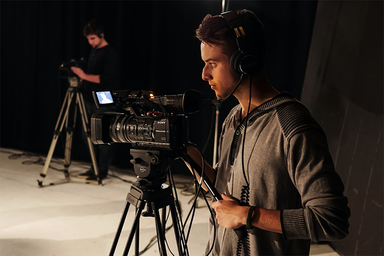 Man broadcasting with camera