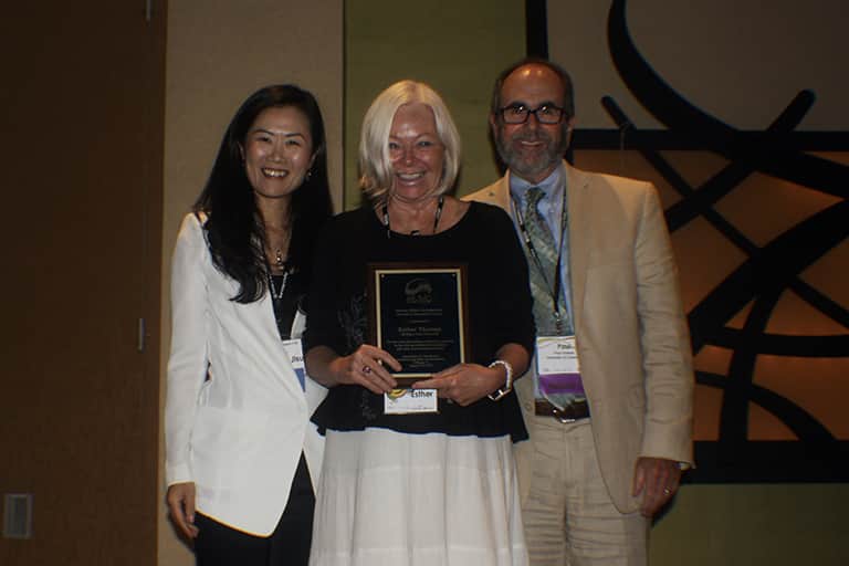 Esther Thorson receives award for her research at the AEJMC Conference. Photo by Kristiana Baker. 