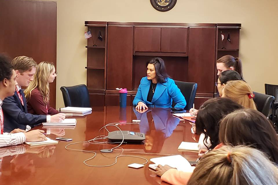 Gov. Whitmer siting with CNS correspondents
