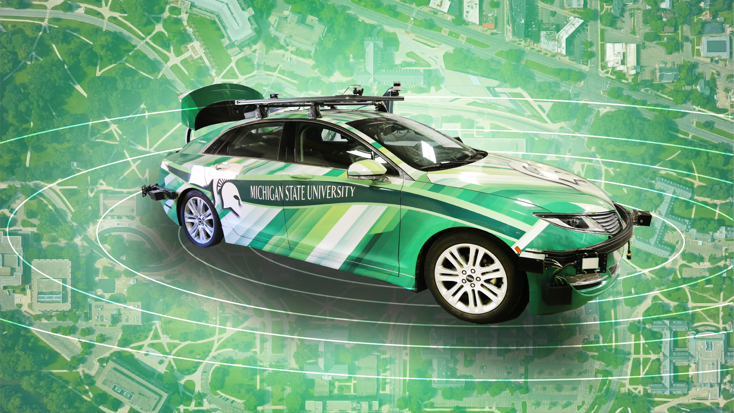 Graphic with photo of MSU's self-driving car
