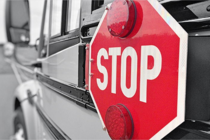 Photo of a stop sign on a school bus