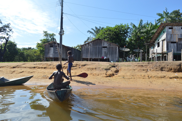 Children boat in the fishing community of Vila Nova, Brazil. Photo by Laura Castro-Diaz.