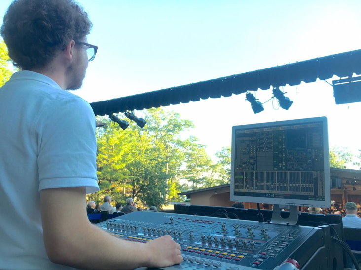Arthur Jones working the sound board at an event.