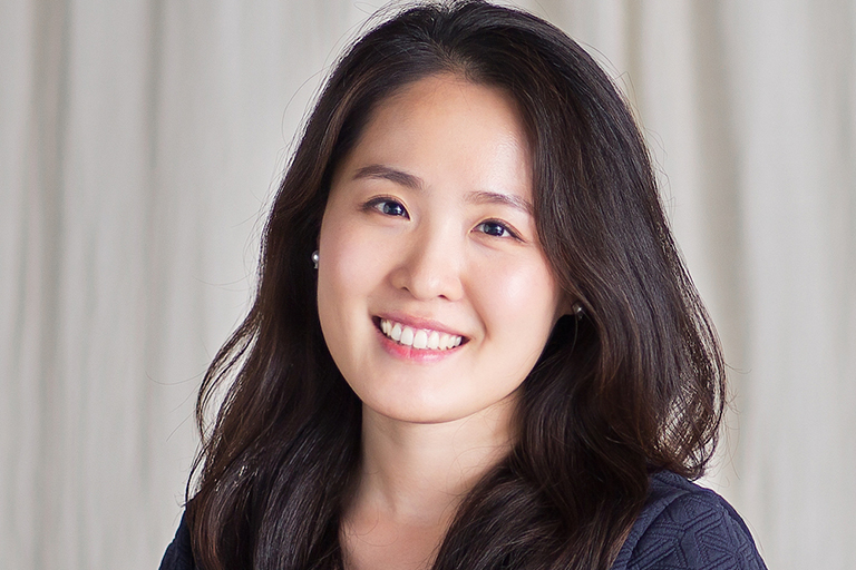 Head and shoulder photo of communication graduate student Soo Shin.