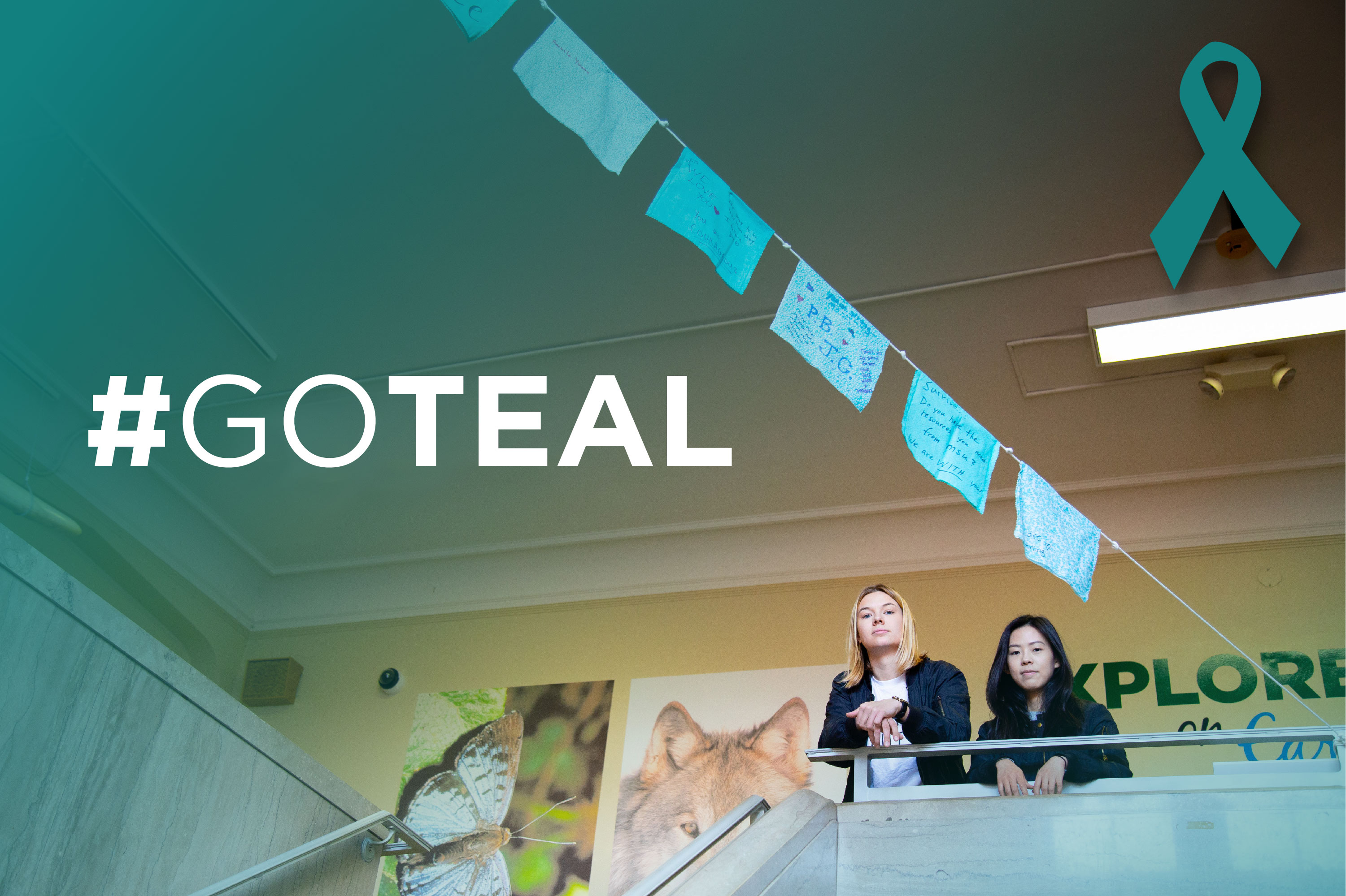Photo of Amanda McCafferty and Tianyi Xie standing in MSU Museum with the words #GoTeal