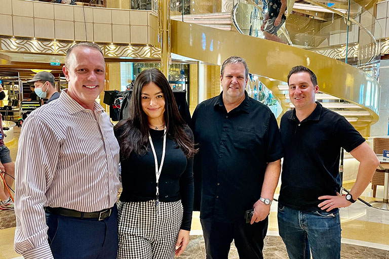 Brian O’Connor, head of communications for Princess and president of the ComArtSci Alumni Board, ComArtSci Senior Alexandra Gise, Michael Seel, manager inaugural events for Princess, and Eric Blomberg, with Wilson Dow Group
