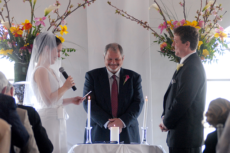 bride recites her vows at wedding ceremony