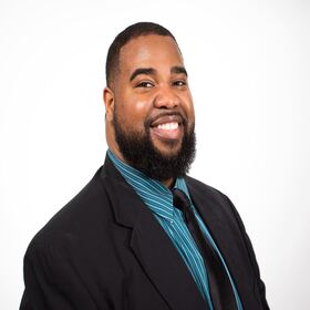 A profile picture of Stephen Spates, Assistant Professor of Communicaiton.