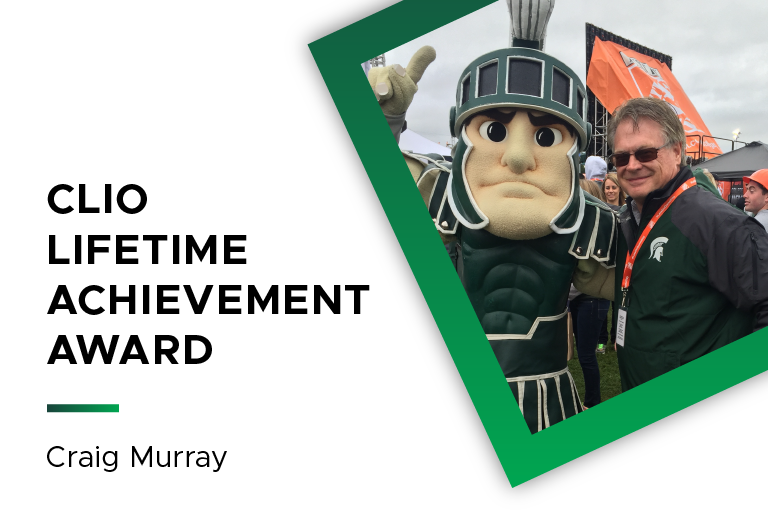 Craig Murray with Sparty mascot. Text reads: Clio Lifetime Achievement Award.