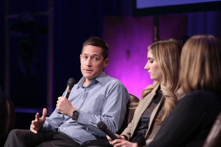 Kyle Andrews speaking on panel during Data Day