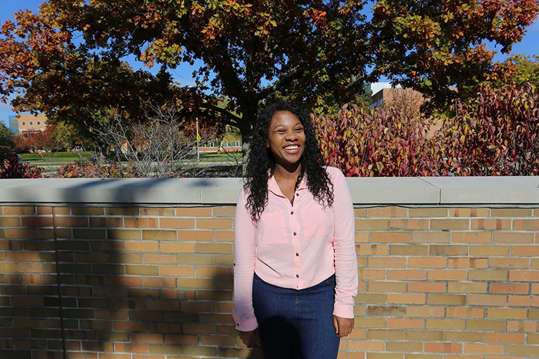 Mastercard Scholar Gigi Ngcobo standing outside 
