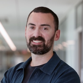 Portrait style photo of Tom Cummins