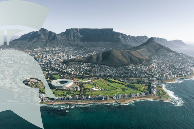 Overhead view of Cape Town, South Africa with a white Spartan helmet over to the left-hand side