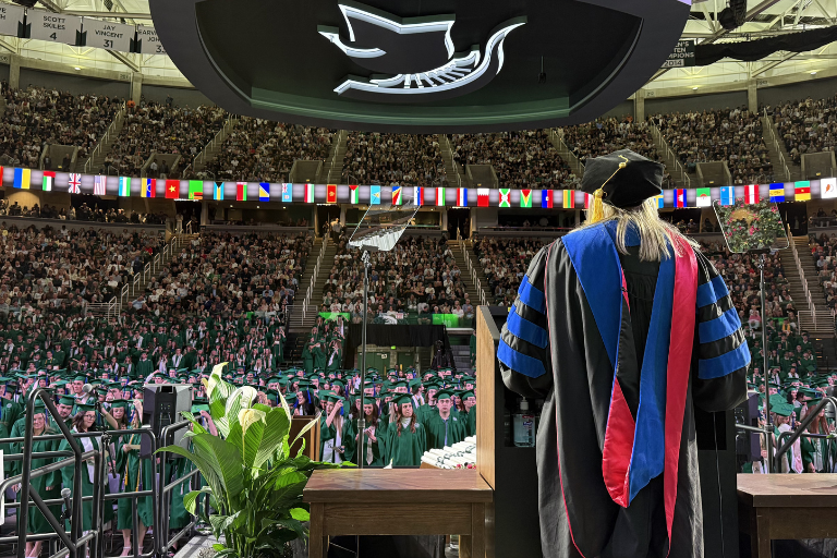 Heidi addressing graduating ComArtSci students during May 1 commencement at the Breslin Center.  