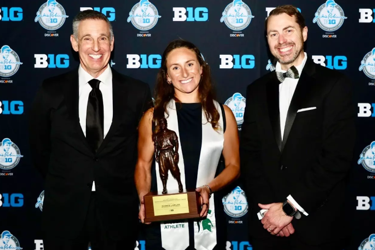 Maddie Lawler receiving award