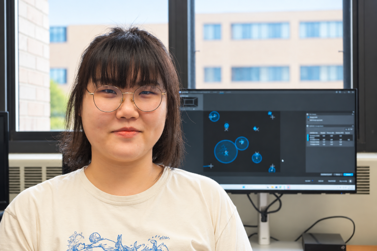 Photo of researcher analyzing eye tracking indicators