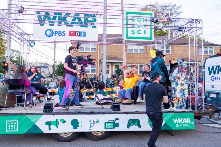 ComArtSci and WKAR Homecoming float
