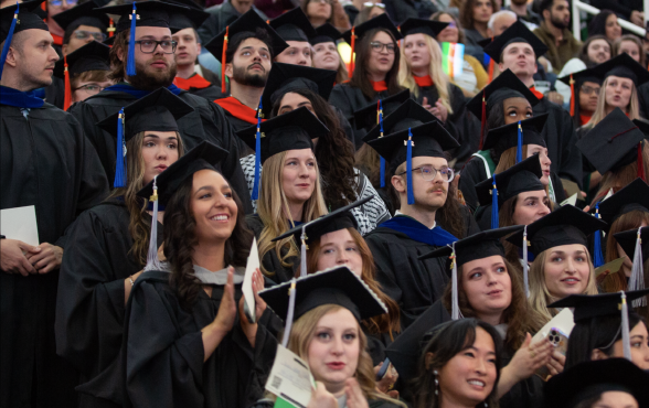 Photo of ComArtSci graduate students at commencement