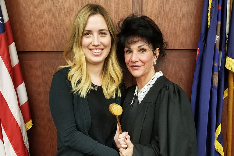 Journalism senior Kaitlin Dudlets with Judge Rosemarie Aquilina.