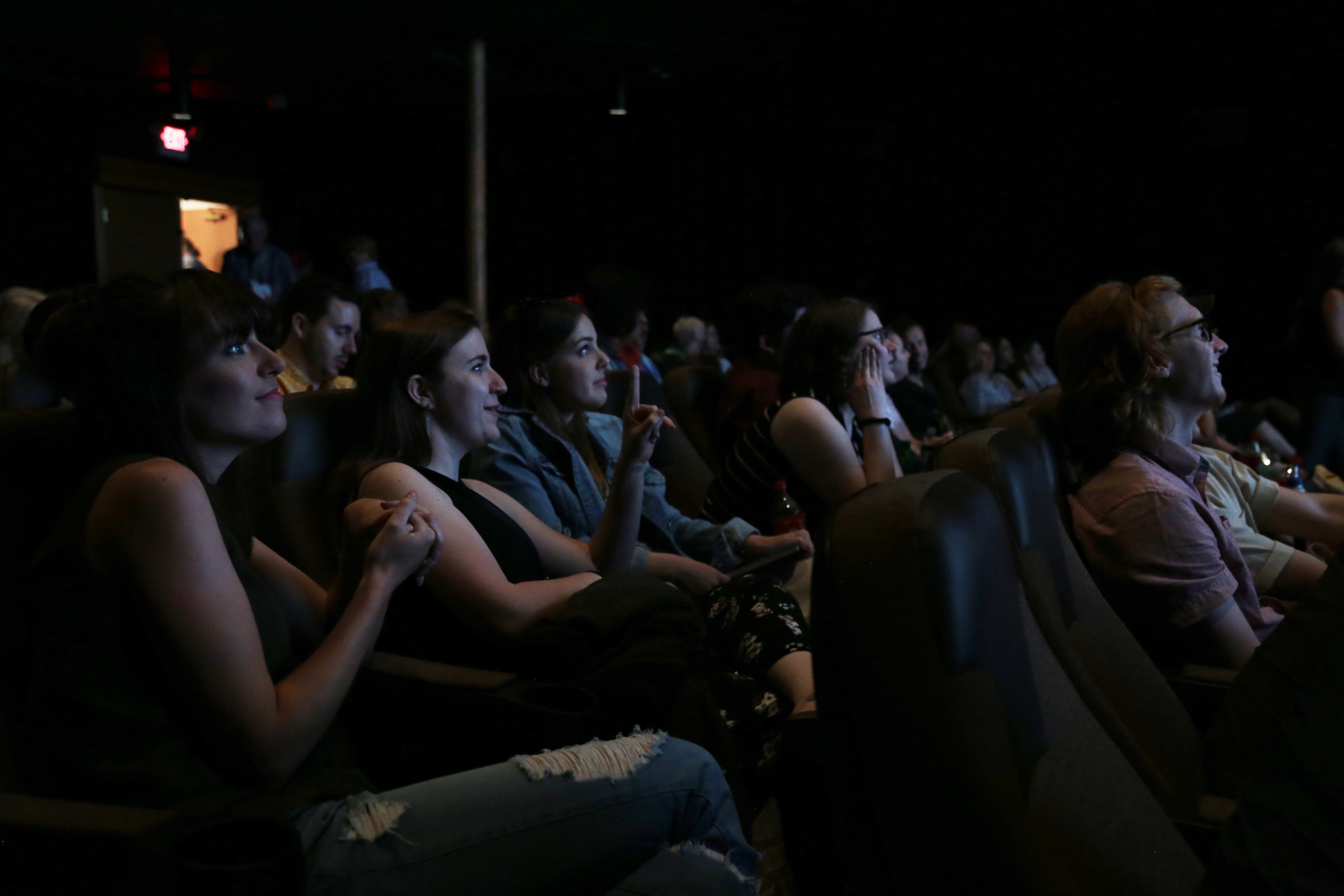 Student filmmakers watch the debut of their film Crandie's.