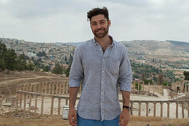 Andrew Joseph standing outside in Jordan.