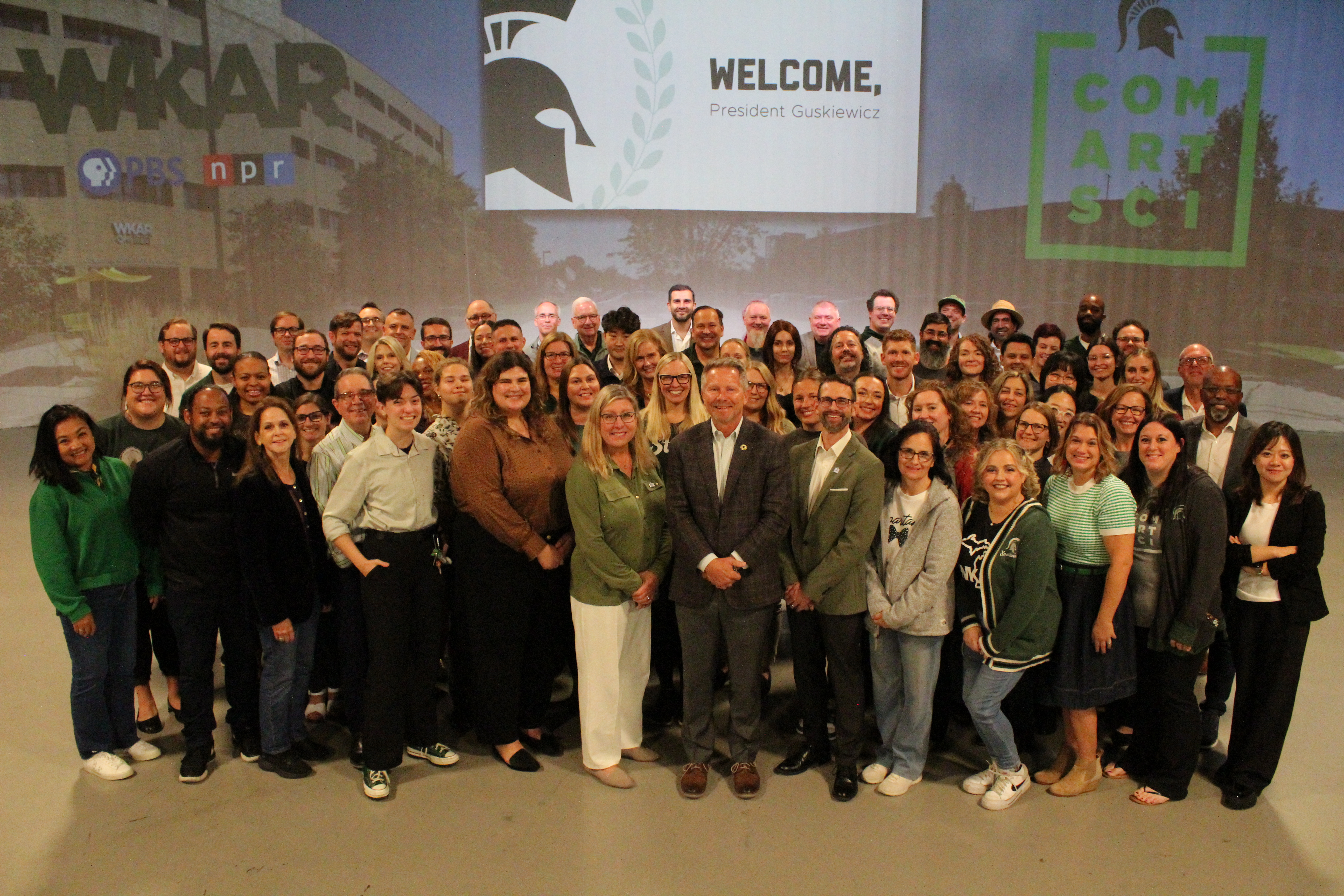 President Guskiewicz and ComArtSci faculty and staff.