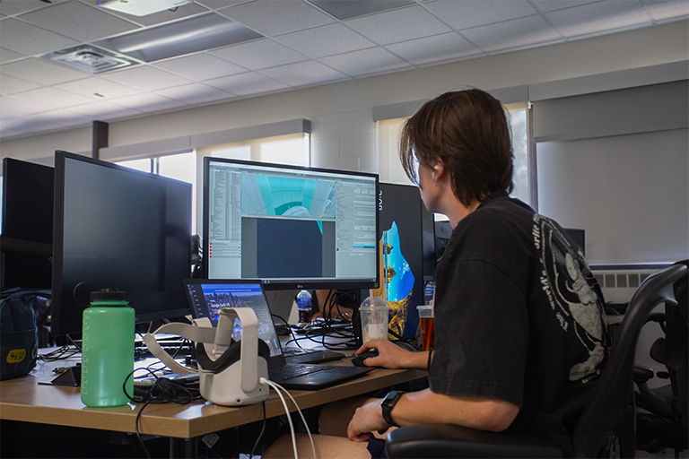 A student in the GEL Lab works on the TLC-VRC project.