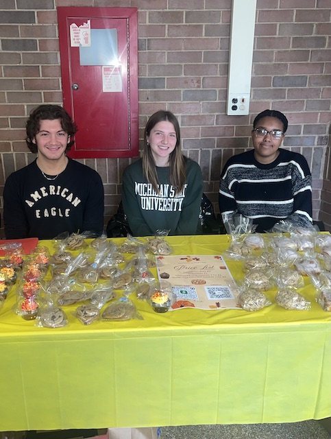 Patrick Fitzsimons (middle) volunteering with fellow students
