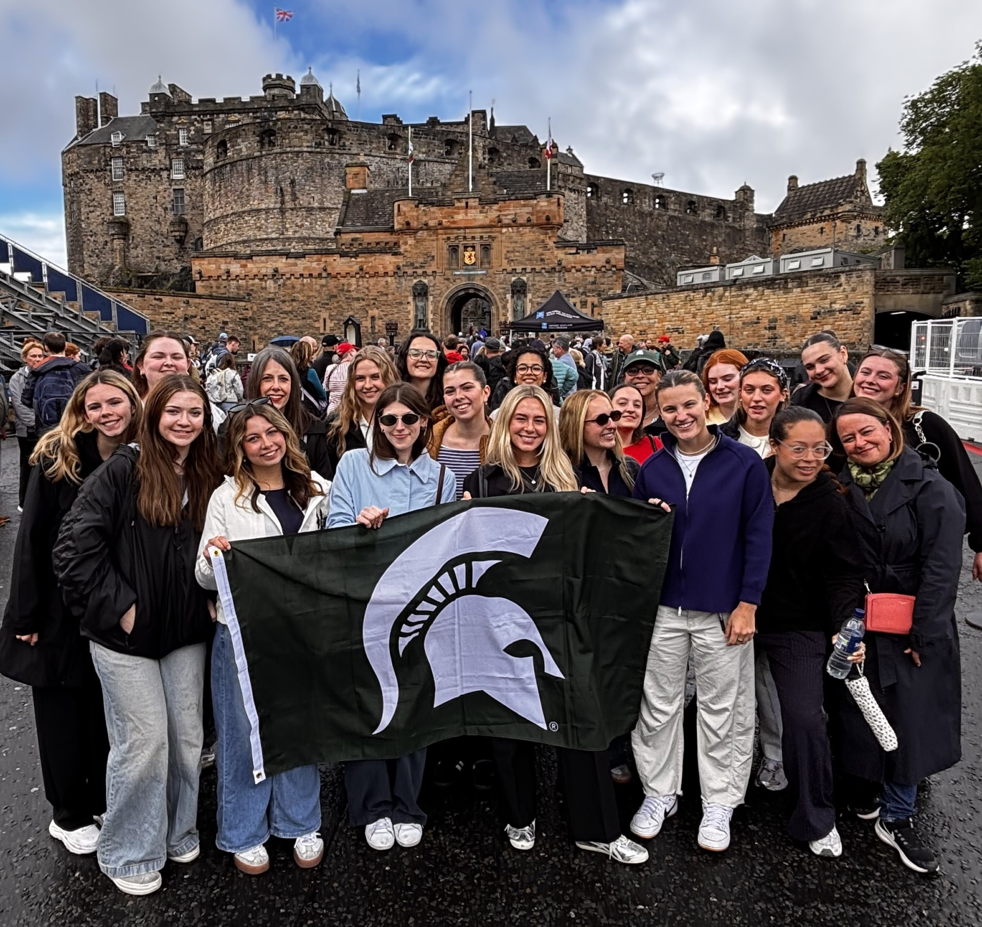 Public Relations in the UK students stand in front of castle during record summer education abroad.