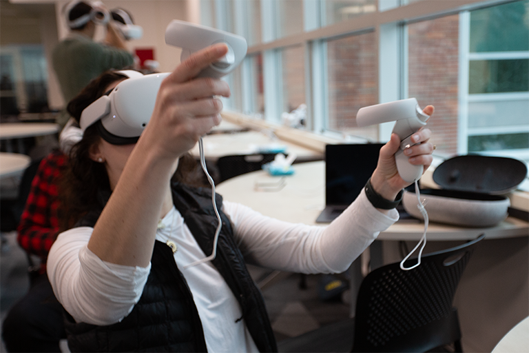 Teaching with VR workshop participant exploring the technology