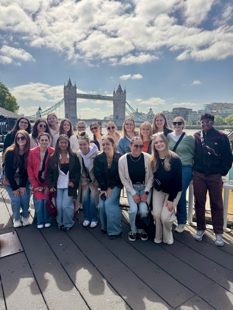 2026 cohort in front of the London Bridge.