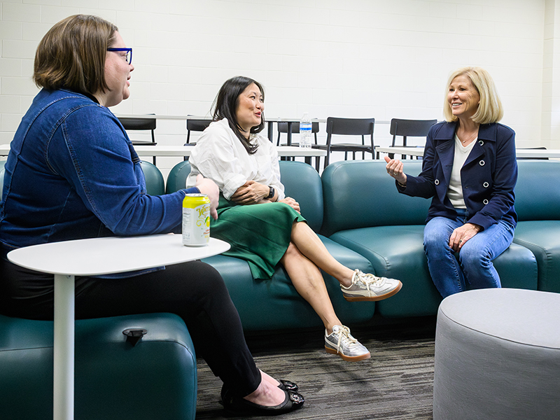 Ann Wright sitting down with two ComArtSci faculty for Finish Line